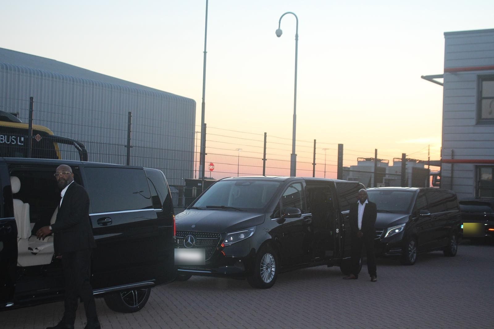 V-Class convoy at the venue at sunset